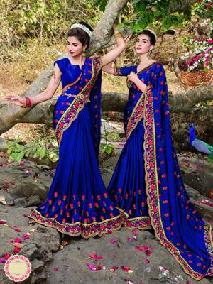 Shine Bright Wearing This Designer Saree In Royal Blue Color Paired With Royal Blue Colored Blouse. This Pretty Saree Is Satin Based Beautified With Attractive Contrasting Embroidery Paired With Art Silk Fabricated Blouse. 