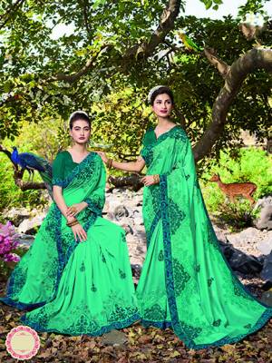 Here Is A Very Beautiful Designer Saree In Turquoise Blue Color Paired With Teal Blue Colored Blouse. This Pretty Saree Is Satin Based Paired With Art Silk Fabricated Blouse. Its Beautiful Two Color Embroidery Gives A pretty Look Like Never Before.