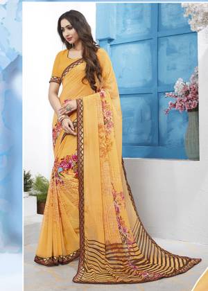 Celebrate This Festive Season Wearing This Pretty Printed Saree In Yellow Color Paired With Yellow Colored Blouse. This Saree And Blouse Are Fabricated On Georgette, Also It Is Light Weight And Easy To Carry All Day Long.