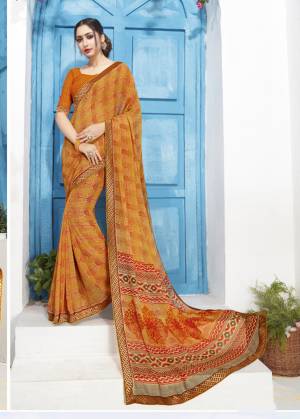 Celebrate This Festive Season Wearing This Pretty Printed Saree In Musturd Yellow Color Paired With Musturd Yellow Colored Blouse. This Saree And Blouse Are Fabricated On Georgette, Also It Is Light Weight And Easy To Carry All Day Long.