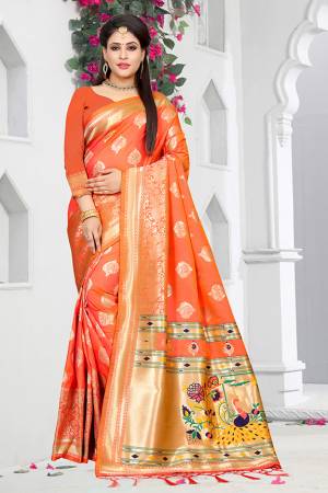 Celebrate This Festive With Traditional Colors Wearing This Pretty Saree In Orange Color Paired With Orange Colored Blouse. This Saree And Blouse are Fabricated On Art Silk Beautified With Weave All Over. Buy This Saree Now.