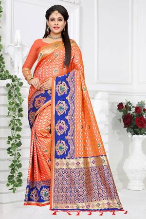 Celebrate This Festive With Traditional Colors Wearing This Pretty Saree In Orange Color Paired With Orange Colored Blouse. This Saree And Blouse are Fabricated On Art Silk Beautified With Weave All Over. Buy This Saree Now.