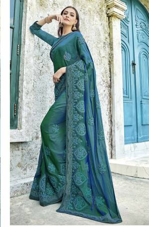 Grab This Very Beautiful Designer Saree In Blue Color Paired With Blue Colored Blouse. This Saree Is Fabricated On Two Tone Silk Paired With Art Silk Fabricated Blouse. The Pretty Two Tone Fabric And Subtle Work Will Earn You Lots Of Compliments From Onlookers. 