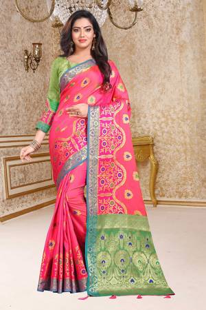 Bright And Visually Appealing Color Is Here With This Saree In Fuschia Pink Color Paired With Contrasting Green Colored Blouse. This Saree And blouse are Silk Based Which Gives A Rich Look To Your Personality. 