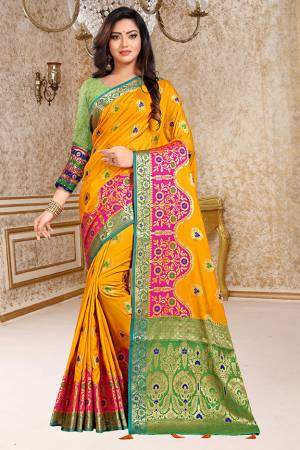 Grab This Beautiful Designer Silk Based Saree In Musturd Yellow Color Paired With Contrasting Green Colored Blouse. This Saree And Blouse Are Fabricated on Soft Silk Beautified With Weave. It Is Durable, Light Weight And Easy To Carry All Day Long. 