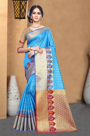 Celebrate This Festive Season With Beauty And Comfort Wearing This Designer Silk Based Saree In Sky Blue Color Paired With Contrasting Magenta Pink Colored Blouse. This Saree And Blouse Are Fabricated On Patola Art Silk Beautified With Weave. 