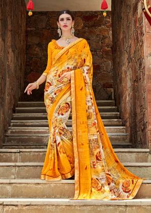 Here Is A Pretty Printed Saree In Yellow Color. This Saree And Blouuse Are Fabricated On Weightless Georgette Beautified Floral Prints And Lace Border. 