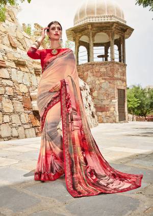 Look Pretty In This Lovely Floral Printed Saree In Peach Color Paired With Contrasting Red Colored Blouse. This Saree And Blouse Are Fabricated On Weightless Georgette Beautified Abstract And Floral Prints All Over. 