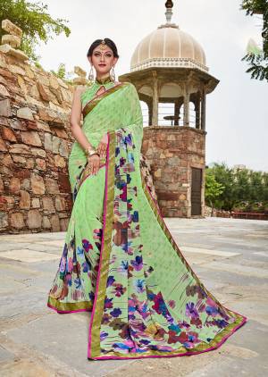 Grab This Beautiful Saree For Your Semi-Casuals In Light Green Color Paired With Light Green Colored Blouse. This Saree And Blouse Are Fabricated on Weightless Georgette Which Is Light In Weight And Easy To Carry All Day Long. 