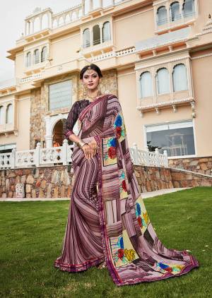 New and Unique Patterned Prints Are Here With This Lovely Saree In Shades Of Wine. This Saree And Blouse are Fabricated On Weightless Georgette Beautified With Prints All Over. Its Fabric Is Soft Towards Skin And Easy To Carry All Day Long. 