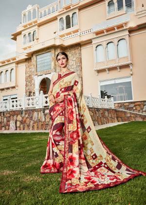Here Is A Pretty Printed Saree In Cream And Red Color. This Saree And Blouse Are Fabricated On Weightless Georgette Beautified Abstract Florasl Prints And Lace Border. 