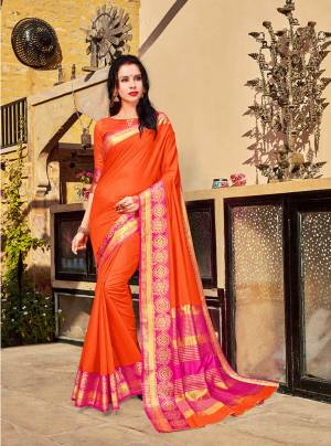 Shine Bright In This Rich And Elegant Looking Silk Based Saree In Orange Color Paired With Orange Colored Blouse. This Saree And Blouse Are Fabricated On Banarasi Art Silk Beautified With Weave Over The Border. Buy Now.