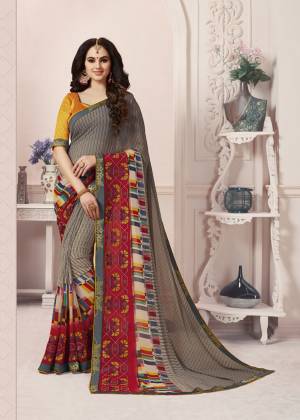 Add This Pretty Saree To Your Wardrobe In Grey & Red Color Paired With Contrasting Musturd Yellow Colored Blouse, This Saree Is Fabricated On Georgette Paired With Art Silk Fabricated Blouse. Buy This Saree Now.