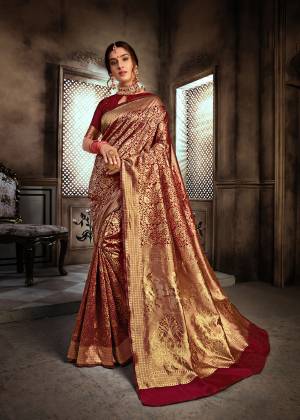 For A Royal Queen Look, Grab This Heavy Weaved Designer Saree In Maroon Color Paired With Maroon Colored Blouse. This Saree And Blouse Are Fabricated On Art Silk Beautified With Attractive Intricate Weave All Over It. Also This Saree Is Durable And Easy To Care For.