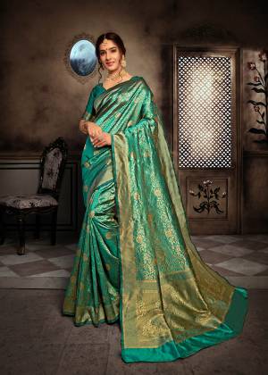 For A Royal Queen Look, Grab This Heavy Weaved Designer Saree In Turquoise Blue Color Paired With Turquoise Blue Colored Blouse. This Saree And Blouse Are Fabricated On Art Silk Beautified With Attractive Intricate Weave All Over It. Also This Saree Is Durable And Easy To Care For.