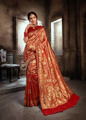 For A Royal Queen Look, Grab This Heavy Weaved Designer Saree In Red Color Paired With Red Colored Blouse. This Saree And Blouse Are Fabricated On Art Silk Beautified With Attractive Intricate Weave All Over It. Also This Saree Is Durable And Easy To Care For.
