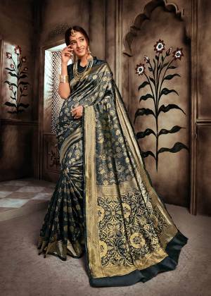 For A Royal Queen Look, Grab This Heavy Weaved Designer Saree In Black Color Paired With Black Colored Blouse. This Saree And Blouse Are Fabricated On Art Silk Beautified With Attractive Intricate Weave All Over It. Also This Saree Is Durable And Easy To Care For.