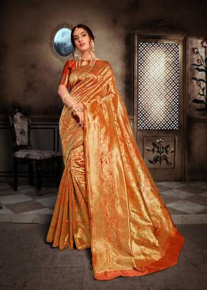 For A Royal Queen Look, Grab This Heavy Weaved Designer Saree In Rust Orange Color Paired With Rust Orange Colored Blouse. This Saree And Blouse Are Fabricated On Art Silk Beautified With Attractive Intricate Weave All Over It. Also This Saree Is Durable And Easy To Care For.