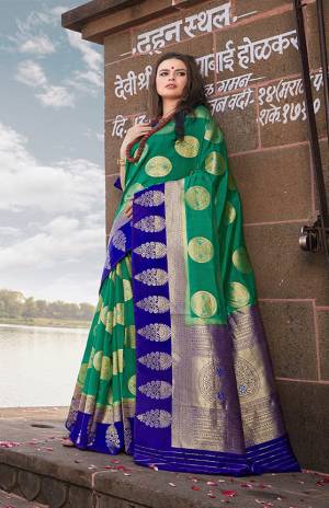 Simple And Elegant Saree Is Here For The Upcoming Festive Season. This Nylon Art Silk Fabricated Saree Is In Sea Green Color Paired With Contrasting Royal Blue Colored Blouse. It Is Beautified With Weave All Over. Buy Now.