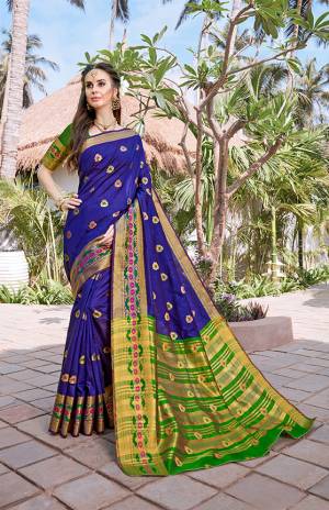 Celebrate This Festive Season With Beauty And Comfort Wearing This Silk Based Saree In Royal Blue Color Paired With Contrasting Green Colored Blouse. This Saree And Blouse Are Fabricated On Banarasi Art Silk Beautified With Weave All Over. Buy This Saree Now.