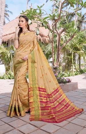 Celebrate This Festive Season With Beauty And Comfort Wearing This Silk Based Saree In Beige Color Paired With Contrasting Dark Pink Colored Blouse. This Saree And Blouse Are Fabricated On Banarasi Art Silk Beautified With Weave All Over. Buy This Saree Now.