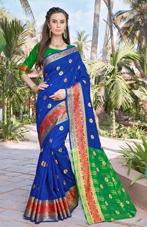 Celebrate This Festive Season With Beauty And Comfort Wearing This Silk Based Saree In Blue Color Paired With Contrasting Green Colored Blouse. This Saree And Blouse Are Fabricated On Banarasi Art Silk Beautified With Weave All Over. Buy This Saree Now.