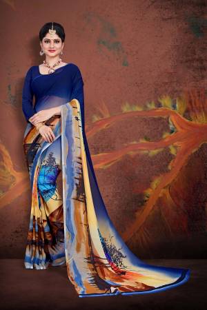 Simple And Elegant Saree For Your Casuals Or Semi-Casuals Is Here In Navy Blue And Multi Color Paired With Navy Blue Colored Blouse. This Saree And Blouse Are Fabricated On Georgette Beautified With Prints.
