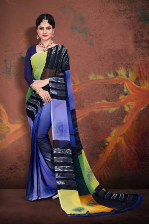 Bright And Appealing Shaded Saree Is Here In Blue Color Paired With Dark Blue Colored Blouse. This Saree and Blouse Are Georgette Based Which Is Soft Towards Skin And Easy To Carry All Day Long. 