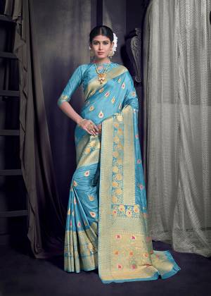 Simple and Elegant Looking Designer Saree Is Gere In Sky Blue Color Paired With Sky Blue Colored Blouse. This Saree And Blouse are Fabricated On Art Silk Beautified With Weaved Motifs And Border. 