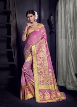 Look Pretty In This Designer Saree In Pink Color Paired With Pink Colored Blouse. This Saree And Blouse Are Fabricated On Art Silk Beautified With Weave All Over. It Is Light Weight, Durable And Easy To Carry All Day Long.