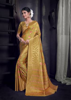 Attract All Wearing This Very Pretty Golden Colored Designer Saree Piared With Golden Colored Blouse. This Saree And Blouse are Fabricated On Art Silk Beautified With Contrasting Weave. 