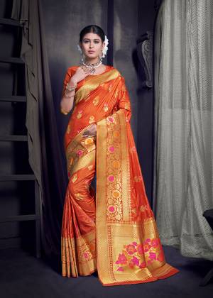 Celebrate This Festive Season With Heavy Weaved Designer Saree In Orange Color Paired With Orange Colored Blouse. This Saree And blouse Are Fabricated On Art Silk Beautified With Weave. 