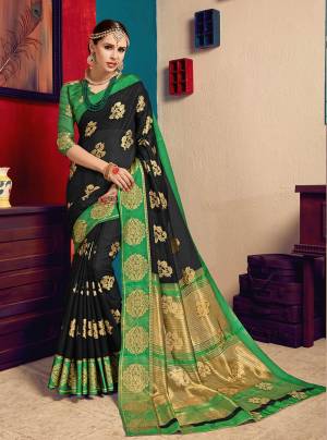 For A Bold And Beautiful Look, Grab This Cotton Based Saree In Black Color Paired With Green Colored Blouse. This Saree Is Fabricated On Cotton Silk Paired With Art Silk Fabricated Blouse. It Has Pretty Weaved Motifs All Over It. Buy Now.