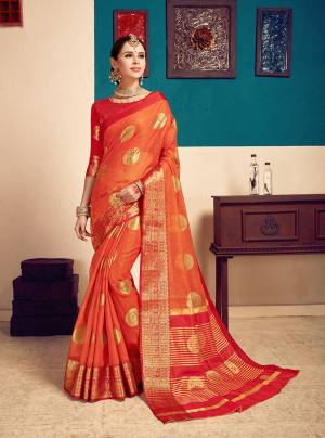 Catch All The Limelight When You Wear This Pretty Saree In Orange Color Paired With Contrasting Red Colored Blouse. This Saree Is Cotton Silk Based Paired With Art Silk Fabricated Blouse. Buy Now.