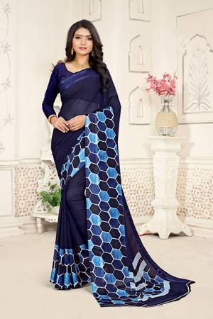 Get Ready For This Summer With This Pretty Light Weight Saree In Navy Blue Color. This Saree And Blouse are Georgette Based Which Is Soft Towards Skin And Easy To Carry All Day Long. Buy This Saree Now.
