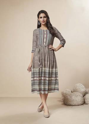 Rich And Elegant Looking Designer Readymade Kurti Is Here In Grey Color Fabricated On Rayon. It Has Very Elegant And Minimal Prints Giving A Subtle Look To The Kurti. 