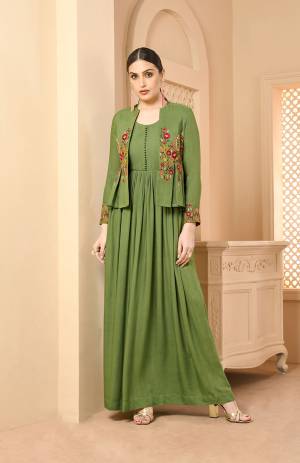 Grab This Jacket Patterned Designer Readymade Long Kurti In Green Color Fabricated On Rayon. Its Pretty Jacket Is Beautified With Contrasting Thread Work Giving It An Attractive Look. Buy Now.