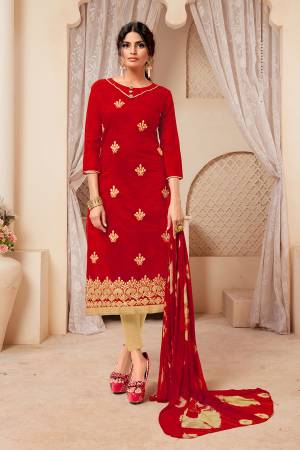 Here Is An Evergreen Combination With This Dress Material In Red Colored Top Paired With Beige Colored Bottom And Red Colored Dupatta. Its Top Is Modal Silk Based Paired With Cotton Bottom And Chiffon Fabricated Dupatta. 