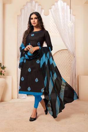 Grab This Pretty Dress Material For Your Casuals Or Semi-Casuals In Black Colored Top Paired With Blue Colored Bottom And Black Dupatta. Its Top IS Fabricated On Modal Silk Paired With Cotton Bottom And Chiffon Fabricated Dupatta.