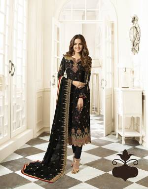 Enhance Your Personality Wearing This Designer Straight Suit In Black Color. Its Heavy Embroidered Top Is Georgette Based Paired With Santoon Bottom And Georgette Dupatta. Also It Comes A Digital Printed Inner Fabricated On Satin. Buy Now.