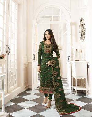 Enhance Your Personality Wearing This Designer Straight Suit In Green Color. Its Heavy Embroidered Top Is Georgette Based Paired With Santoon Bottom And Georgette Dupatta. Also It Comes A Digital Printed Inner Fabricated On Satin. Buy Now.