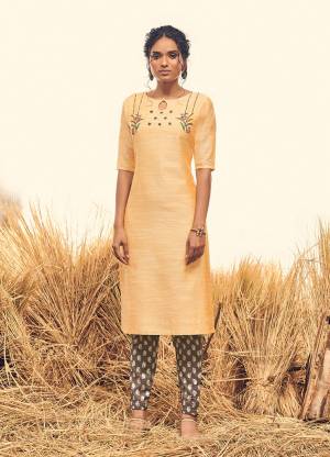 Celebrate This Festive Season With Beauty And Comfort Wearing This Designer Readymade Pair Of Kurti And Pant In Light Yellow And Grey Color Respectively. Both The Top And Bottom Are Viscose Silk Based. It Is Light In Weight And Easy To Carry All Day Long. 