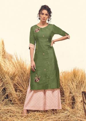 Proper Traditonal Look Is Here With This Readymade Pair Of Kurti And Plazzo In Olive Green And Pink Color. Its Top IS Fabricated On Viscose Silk Paired With Soft Silk Fabricated Bottom. Buy This Pair Now.