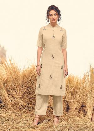 Flaunt Your Rich And Elegant Taste With This Readymade Designer Pair Of Kurti And Pant. This Pair Is Fabricated On Visose silk Beautified With Hand Work Motifs On Top. Its Rich Fabric And Color Will Earn You Lots Of Compliments From Onlookers.