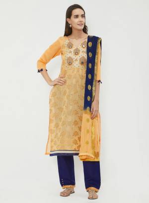 If Those Readymade Suit Does Not Lend You Desired Comfort, Than Grab This Dress Material In Light Orange And Navy Blue Color. Its top Is Fabricated On Chanderi Jacquard Paired With Cotton Bottom And Dupatta. Get This Stitched As Per Your Desired Fit And Comfort. Buy Now.