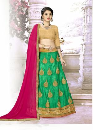 Grab This Beautiful Designer Lehenga Choli In Golden Colored Blouse Paired With Green Colored Lehenga And Contrasting Rani Pink Colored Dupatta. Its Blouse IS Silk Based Paired With Satin Silk Embroidered Lehenga And Chiffon Fabricated Dupatta. Buy Now.