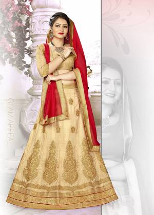 Grab This Beautiful Designer Lehenga Choli In Golden Colored Blouse Paired With Beige Colored Lehenga And Contrasting Red Colored Dupatta. Its Blouse IS Silk Based Paired With Satin Silk Embroidered Lehenga And Chiffon Fabricated Dupatta. Buy Now.