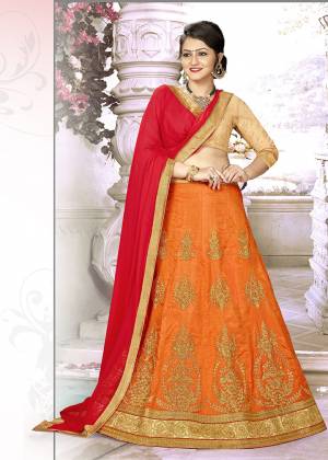 Add This Pretty Designer Lehenga Choli To Your Wardrobe In Golden Colored Blouse Paired With Orange Colored Lehenga And Contrasting Red Colored Dupatta. Its Blouse Is Fabricated on Art Silk Paired With Satin Silk Lehenga And Chiffon Dupatta. All Its Fabrics Are Light Weight And Easy To Carry Throughout The Gala.