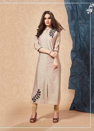 For Your Semi-Casuals Or Social Gatherings, Grab This Designer Readymade Kurti In Beige Color. It Has Pretty Attractive Hand Work Which Gives A Rich And Elegant Look Over All. Buy Now.