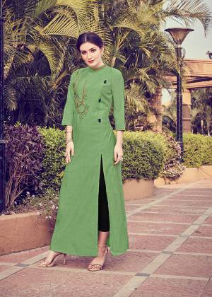 Add This Pretty Readymade Kurti To your Wardrobe In Green Color. It Is Beautified With Unique Pattern And Attractive Embroidery Which Will Earn You Lots Of Compliments From Onlookers. 